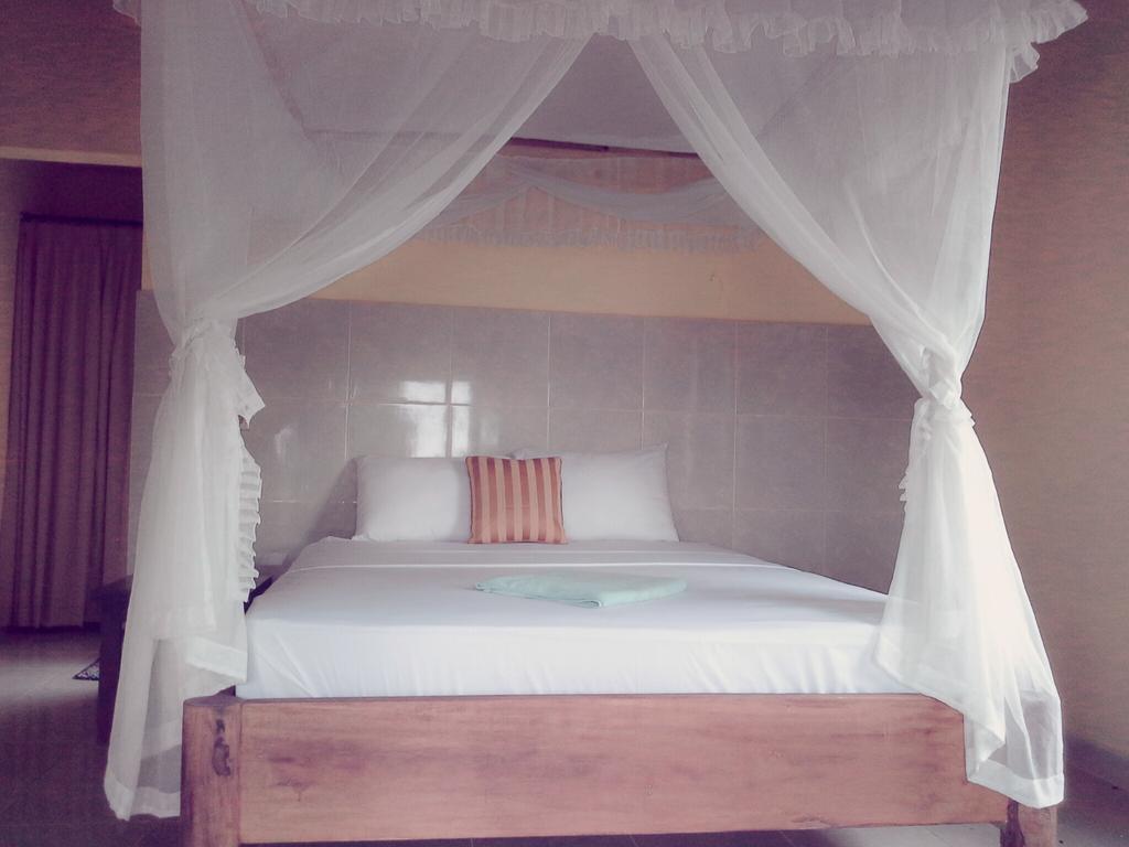 Rumahku Homestay Amed Rom bilde