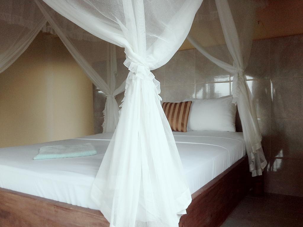 Rumahku Homestay Amed Rom bilde