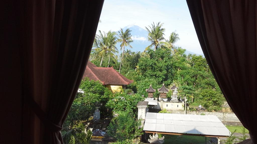 Rumahku Homestay Amed Rom bilde