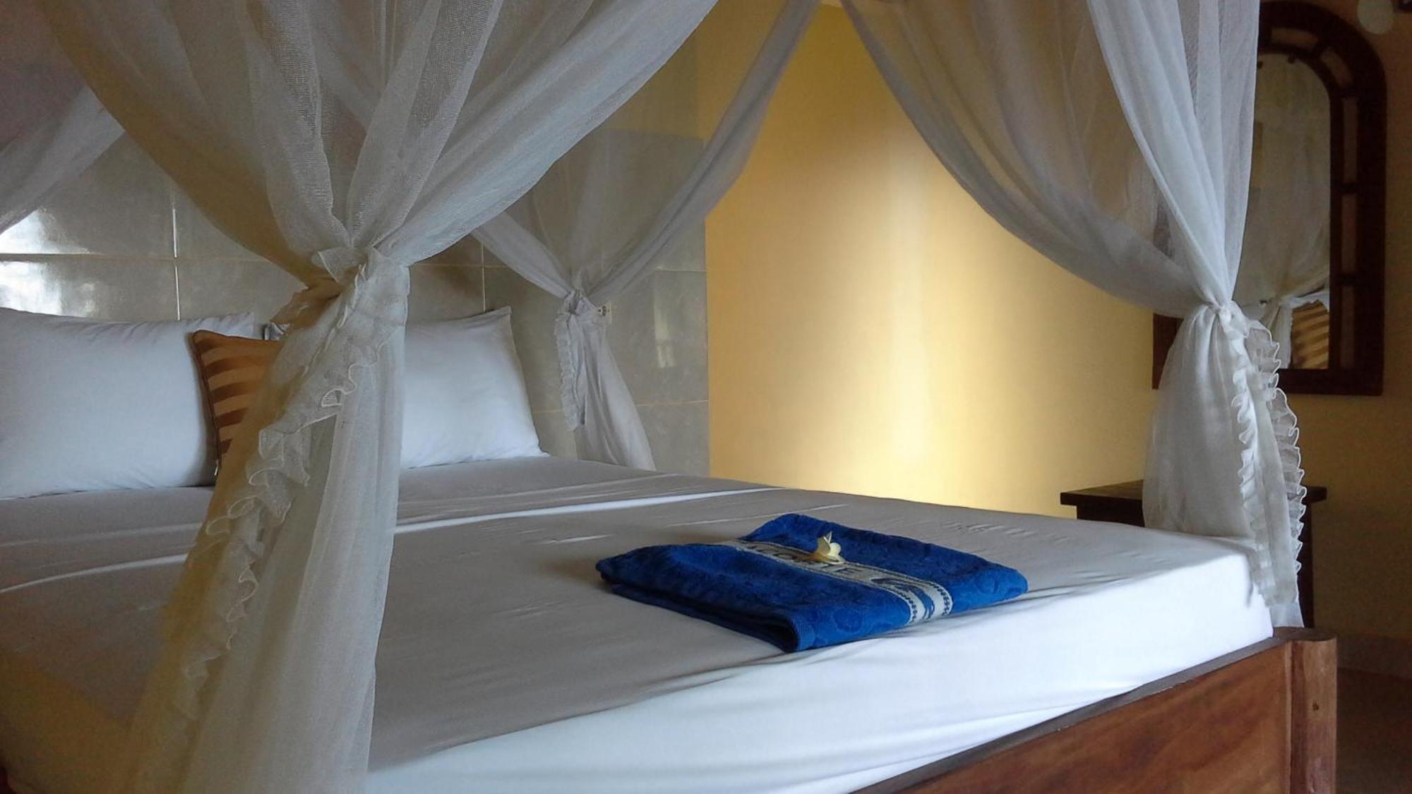 Rumahku Homestay Amed Rom bilde